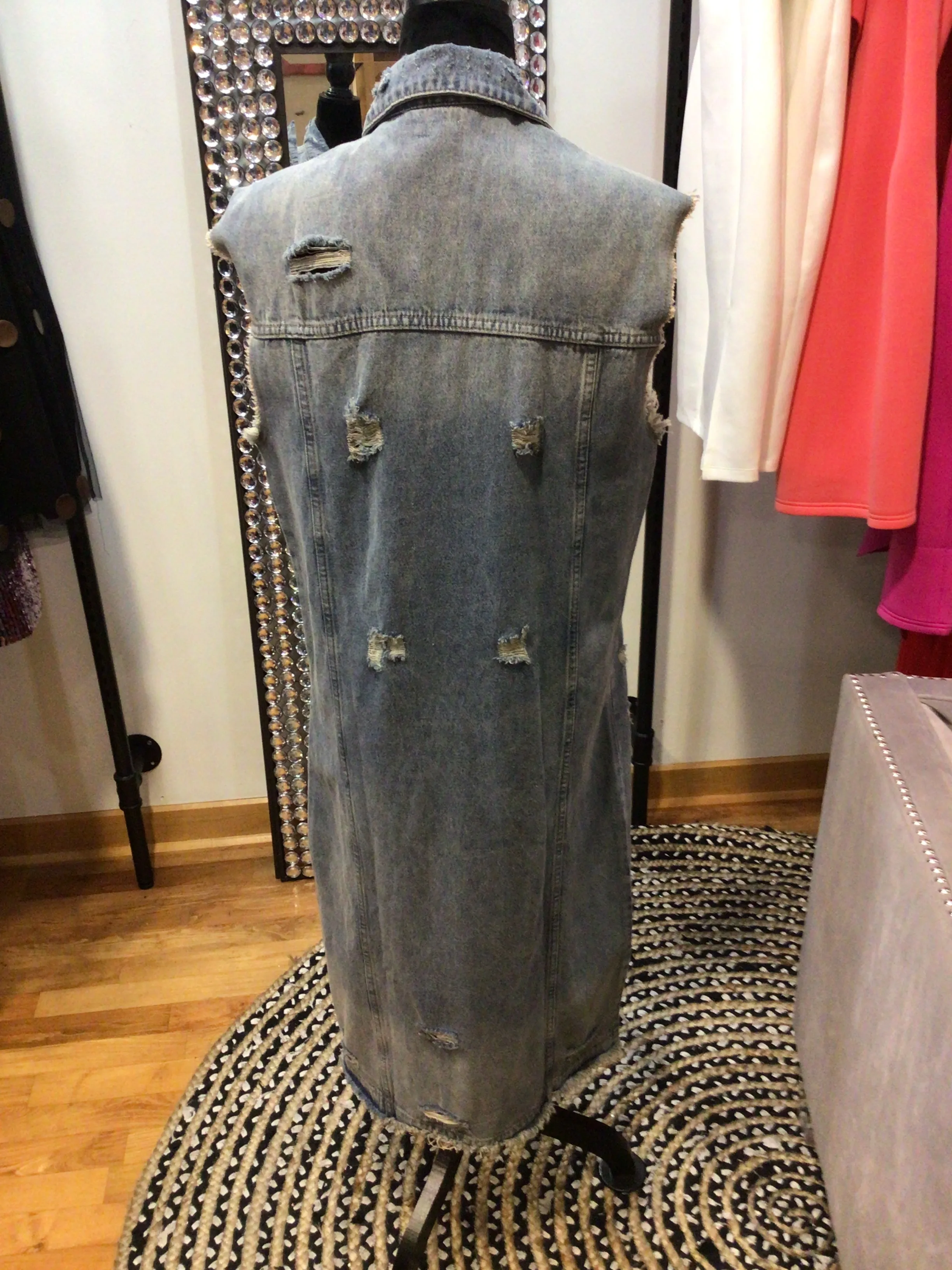 Long distressed denim vest