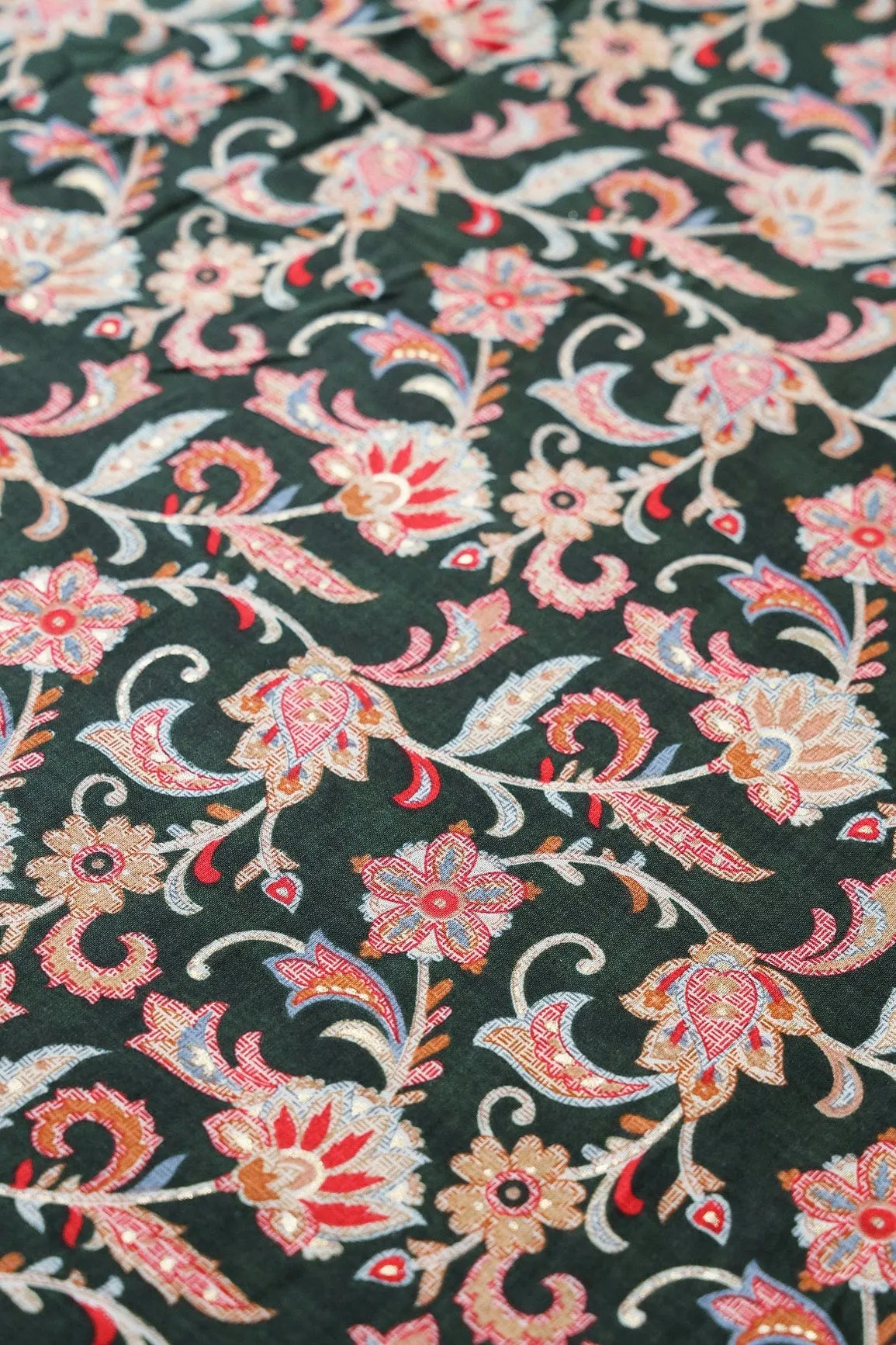 Multi Color Floral Pattern With Foil Print On Bottle Green Pure Rayon Fabric